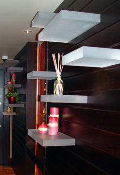 3Form Chroma shelves "float" at wood wall